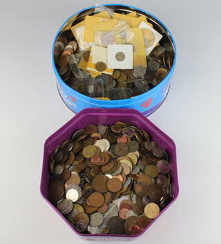 Two tins of mixed British and European coinage