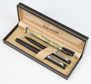 A matt black Sheaffer fountain pen together with a ditto ballpoint pen boxed
