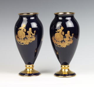 A pair of Limoges blue ground vases with gilt fete gallant views, 23cm 