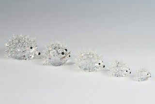 A Swarovski Crystal figure of a hedgehog 4cm, ditto 4cm and 3 others 3.5cm, 2.5cm and 1.5cm  