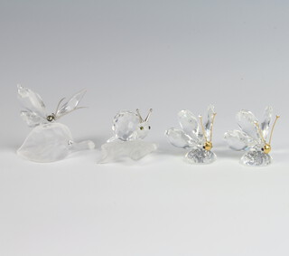 A Swarovski Crystal figure of a butterfly on a leaf 4cm, ditto of a snail on a leaf 3cm and 2 figures of butterflies 3cm 