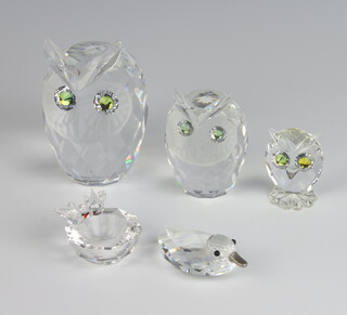 Three Swarovski Crystal figures of owls 6.5cm, 5cm and 3cm, a duck 1cm and a bird bath and 2 birds 2cm  