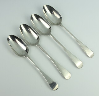 Four early Georgian silver table spoons, 256 grams, marks rubbed