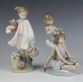 A Lladro figure of a girl holding a pot of plants with birds in a basket no.8240 23cm, ditto of 2 girl ballerinas 21cm 5714 boxed 