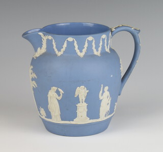 A Wedgwood blue Jasperware jug decorated with classical figures 12cm 