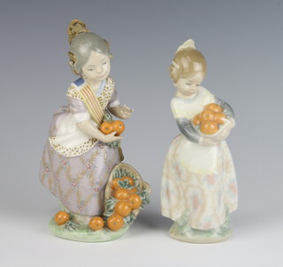 A Lladro figure of a Spanish girl with oranges 1422 18cm, a ditto 16cm 
