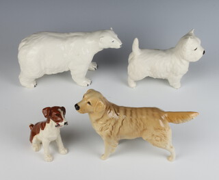 A Beswick figure of a standing polar bear 11cm, ditto labrador 13cm, ditto West Highland Terrier matt finish 12cm and a ditto of a seated terrier holding a toy 10cm 