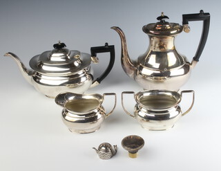 A silver plated 4 piece tea set with ebony mounts 