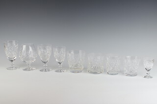 A suite of Royal Doulton glassware comprising 9 small tumblers, 6 liqueur glasses, 6 sherries, 6 small wines, 6 large wines, 6 brandy glasses, 6 small tapered tumblers, 6 small water glasses, 6 large wine glasses, 6 champagne glasses, 3 highball glasses, 5 wines  