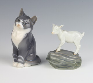 A Royal Copenhagen figure of a seated cat 1803 12cm, a ditto of a goat on a rock 4760 9cm 