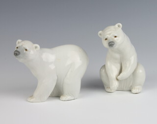 A Lladro figure of a seated polar bear 11cm, a standing ditto 9.5cm 