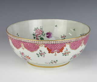 An 18th Century Chinese export famille rose punch bowl, the interior and exterior decorated with flowers 29cm 