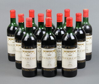 Twelve bottles of 1969 Baron Philippe de Rothschild Mouton Cadet, shipped by Edward Young & Company  