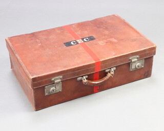 A brown leather suitcase with chrome fittings 18cm x 60cm x 37cm 