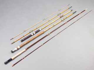 A Permaflex 2 piece bamboo fishing rod, 1 other bamboo rod and a Varnac 2 piece carbon fibre rod contained in a tube 
