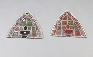 A pair of Victorian arched shaped stained glass panels 37cm x 35cm 