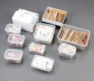 A quantity of loose GB and world stamps contained in a fruit box 