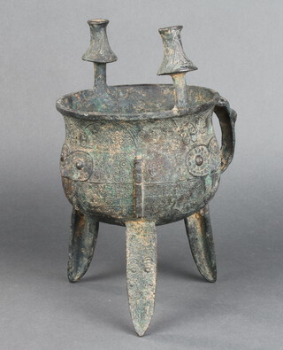 A reproduction Chinese bronze Jai wine vessel, raised on panelled supports 24cm x 14cm 