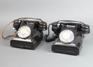 A black Bakelite dial telephone the base fitted a drawer and marked 332L PL57/2A together with 1 other 