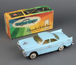 A Chinese tinplate Streamline Electric Sedan ME009 battery powered car in turquoise, boxed 