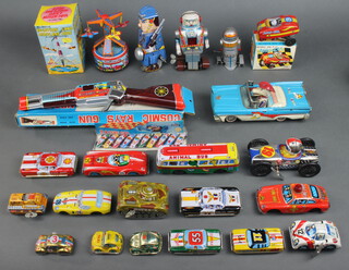 A collection of Japanese tinplate clockwork and other toys 
