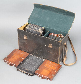 A rectangular black leather photographic plate case containing 8 various photographic plates 