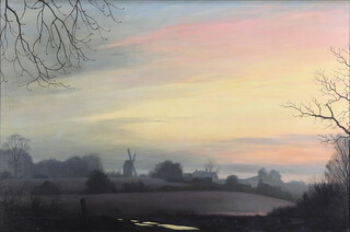 Michael Morris (1938-2010), oil on canvas "Sussex Sunset" sunset study with windmill and distant buildings, signed 59cm x 89cm 