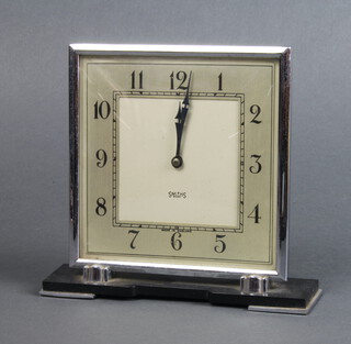 Smiths, an 8 day Art Deco timepiece with square silvered dial, contained in a chrome case 16cm h x 17cm w x 7cm d 