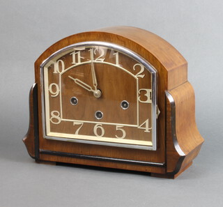 Haller, an Art Deco 1930's Continental 8 day striking mantel clock with arched dial and Arabic numerals contained in a walnut case, 21cm h x 27cm w x 11cm d 