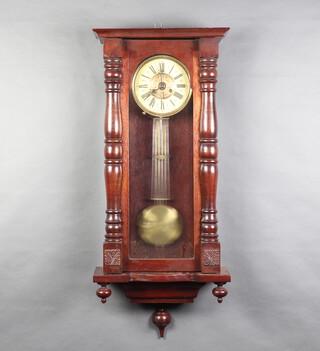 A Vienna style striking regulator with 18cm paper dial and gridiron pendulum, complete with key, contained in a mahogany case 93cm h x 45cm w x 19cm d 