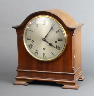 An Edwardian French 8 day chiming bracket clock with 18cm silvered dial, Roman numerals on 2 gongs, the back plate marked Made in France, contained in an arched bleached mahogany case raised on ogee bracket feet 33cm x 30cm x 18cm, complete with pendulum (no key) 