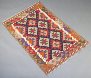 A red, brown and black ground Maimana Kilim rug with all over geometric design 143 x 96cm 
