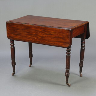 A Victorian mahogany Pembroke table fitted a frieze drawer, raised on turned supports 70cm h x 88cm w x 45cm when closed 