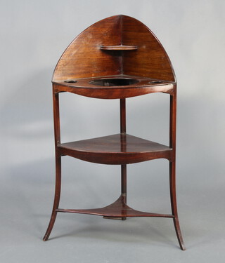 A 19th Century mahogany corner wash stand with raised back fitted 3 bowl recepticals with undertier, on out swept supports 109cm h x 60cm w x 41cm d 