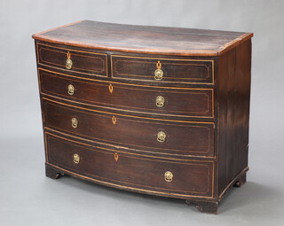 An 18/19th Century oak and mahogany bow front chest with crossbanded top and inlaid satinwood stringing, fitted 2 short and 3 long drawers with replacement drop handles, raised on bracket feet 87cm h x 112cm w x 57cm d  