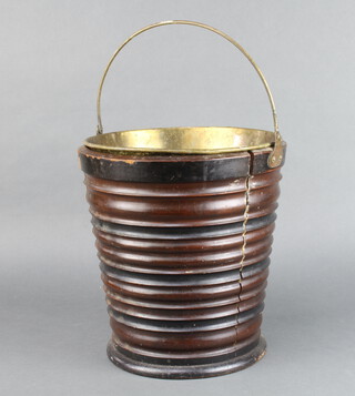 An Edwardian Georgian style circular mahogany plate bucket with swing handle and brass 32cm h x 30cm diam. with part brass liner 