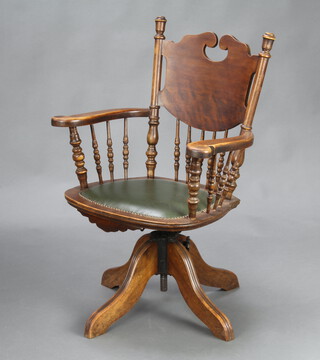 A 19th Century American style tub back revolving office chair with spindle decoration 90cm h x 65cm w x 50cm d (seat 37cm x 33cm) 