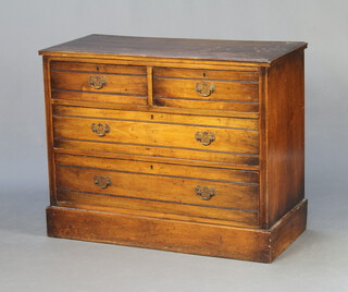 An Edwardian walnut chest of 2 short and 2 long drawers, raised on a platform base 83cm h x 104cm w x 49cm d 