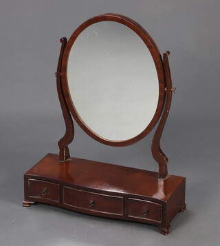 A Georgian style oval plate dressing table mirror contained in a mahogany frame, the serpentine fronted base fitted 3 drawers, on bracket feet 65cm h x 52cm w x 20cm d 