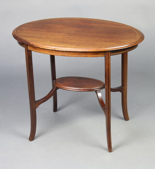 An Edwardian oval inlaid mahogany 2 tier occasional table raised on outswept supports 56cm h x 69cm w x 46cm d 