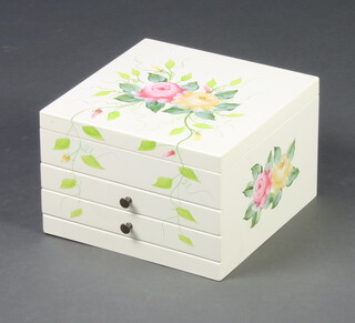 A white and floral painted jewellery box with hinged lid revealing mirrored interior and fitted tray above 2 long drawers 18cm x 27cm x 28cm 