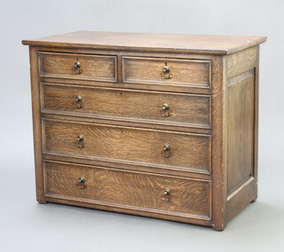 An Edwardian Jacobean style oak chest of 2 short and 3 long drawers 76cm h x 96cm h x 49cm w 