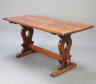 An oak refectory style dining table with standard end supports H framed stretcher 75cm h x 151cm l x 71cm w 