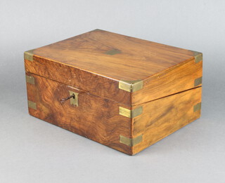 A Victorian figured walnut and brass banded writing slope with hinged lid, fitted an inkwell 15cm x 30cm x 23cm  