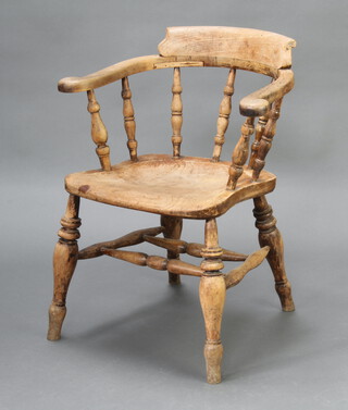 A 19th Century elm smokers bow chair with solid seat and double H framed stretcher 79cm h x 64cm x 44cm (seat 31cm x 30cm)  