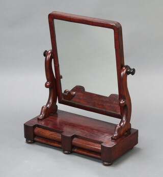 A Victorian rectangular plate dressing table mirror contained in a mahogany swing frame, the shaped base fitted 2 short drawers, raised on bun feet 66cm h x 54cm w x 26cm d 