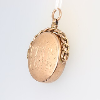 A 9ct yellow gold 2 colour hardstone swivel seal, with engraved monogram 