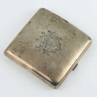 A silver cigarette case with engraved monogram, gross weight 114 grams, Birmingham 1913