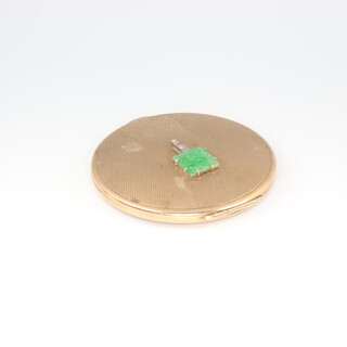 An Art Deco 9ct yellow gold engine turned compact, the lid set with a carved jade plaque and 5 brilliant cut diamonds, maker PP Ltd. gross weight including mirror 60.5 grams 