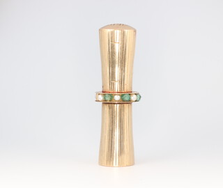 An Art Deco 9ct yellow gold 2 section tapered lipstick holder, the centre band set with 7 seed pearls and 6 emeralds, engraved EME 76mm, (1 removable end weighs 10.4) grams, the gross weight of the entire item is 47 grams 
